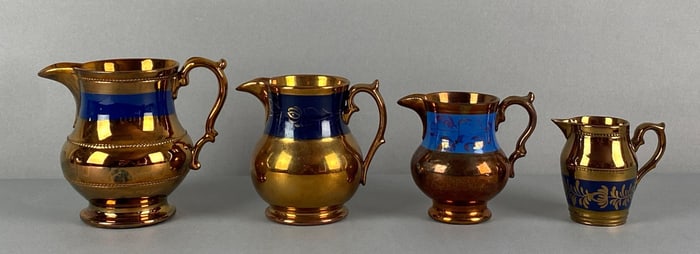 Group of 4 Copper Lusterware Stoneware Pitchers