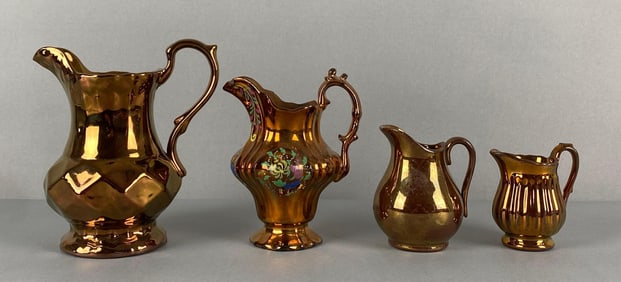Group of 4 Copper Lusterware Stoneware Pitchers
