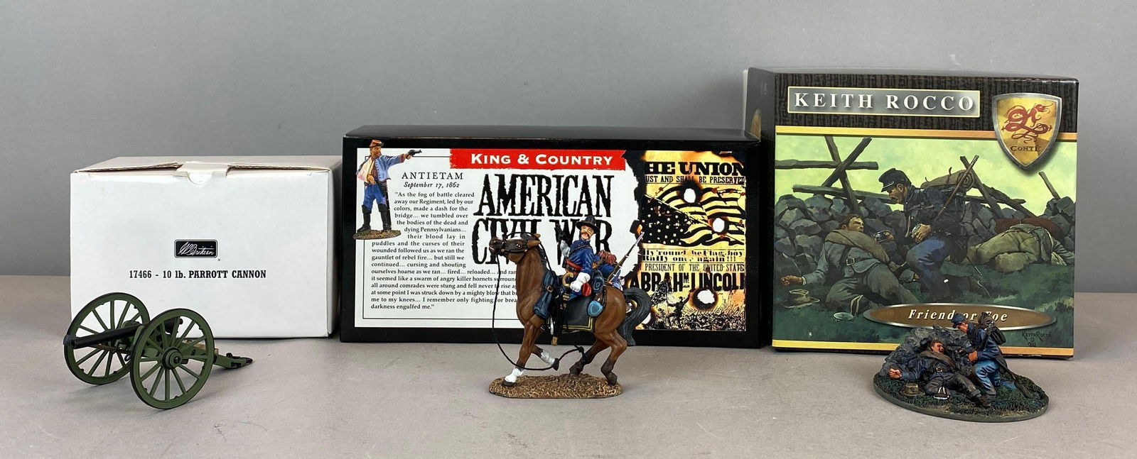 Group of 3 American Civil War Painted Metal Figurines: Includes 10 Ib Parrott Cannon, Keith Rocco Limited Edition friend or foe diorama and Ambrose Burnie Mounted, all in original boxes, tallest measures 3 1/2 inches tall