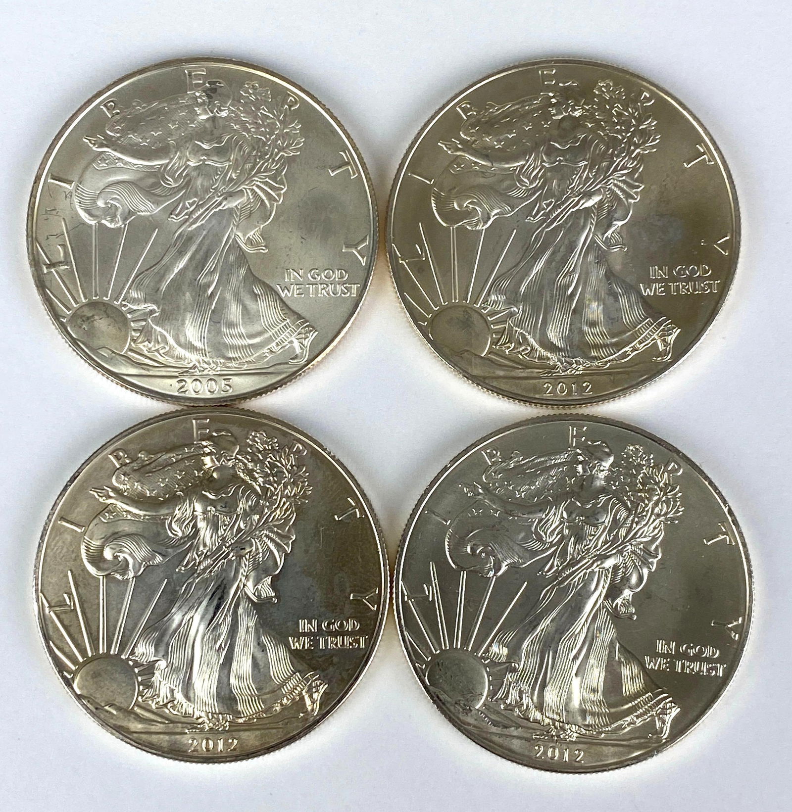 Group of 4 2000s 1 Oz .999 Fine Silver $1 Eagle Coins: Group of 4 2000s 1 Oz .999 Fine Silver $1 Eagle Coins