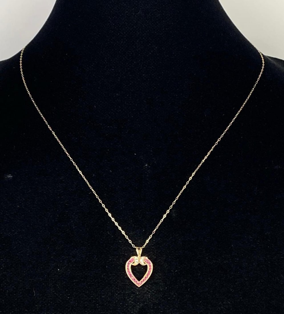14K Gold Chain Necklace with 14K Diamond and Red Spinel Heart Pendant: Total weight 1.7g, Chain measures 20 inches long, Pendant measures 3/4 inch long.
