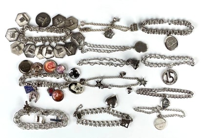 Group of 12 Sterling Silver Charm Bracelets with Charms