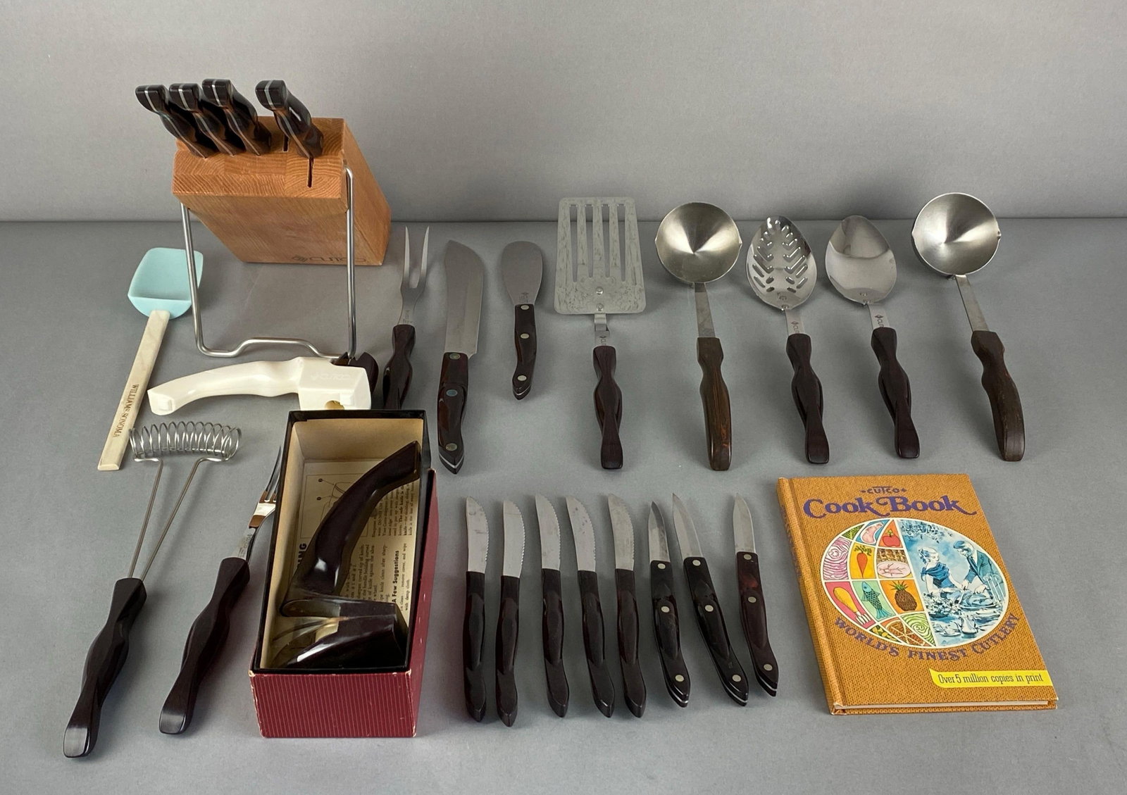 Group of Cutco Flatware and more: Includes knife block with knives, spatula, ladles, cookbook and more, longest flatware measures