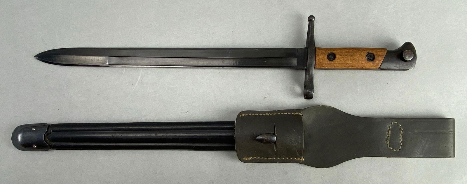 1942 Italian Carcano Model 41 Rifle Bayonet with Scabbard and Frog: Measures 16 1/2 inches in length with a 10 1/2 inch blade