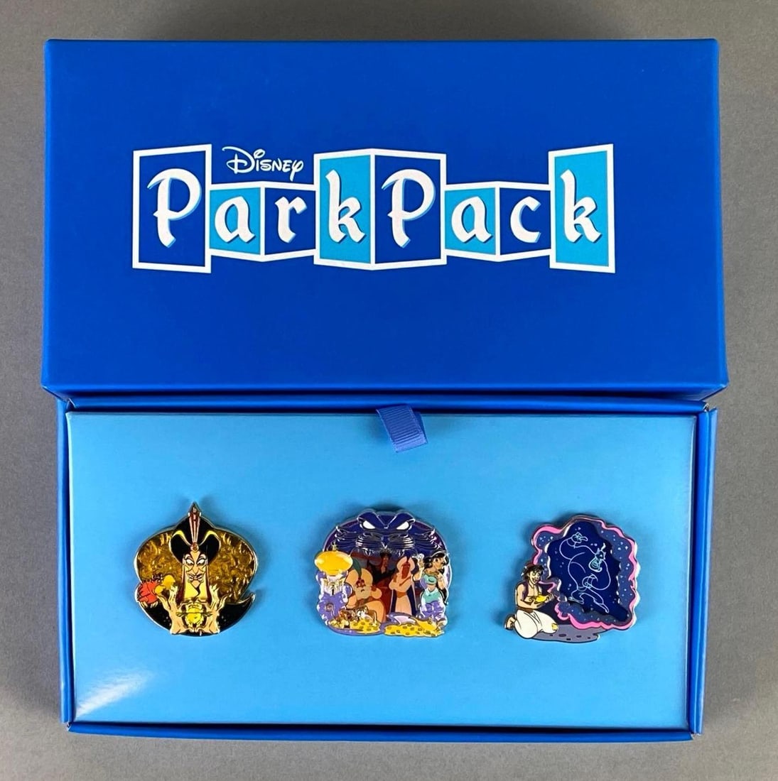 Disney ParkPack Aladdin Enamel 3-Pin Set: Set of 3 enamel pins, Includes Jafar, Aladdin, and Main Characters, Box measures 4 3/4 x 8 1/2 x 2 1/2 inches.