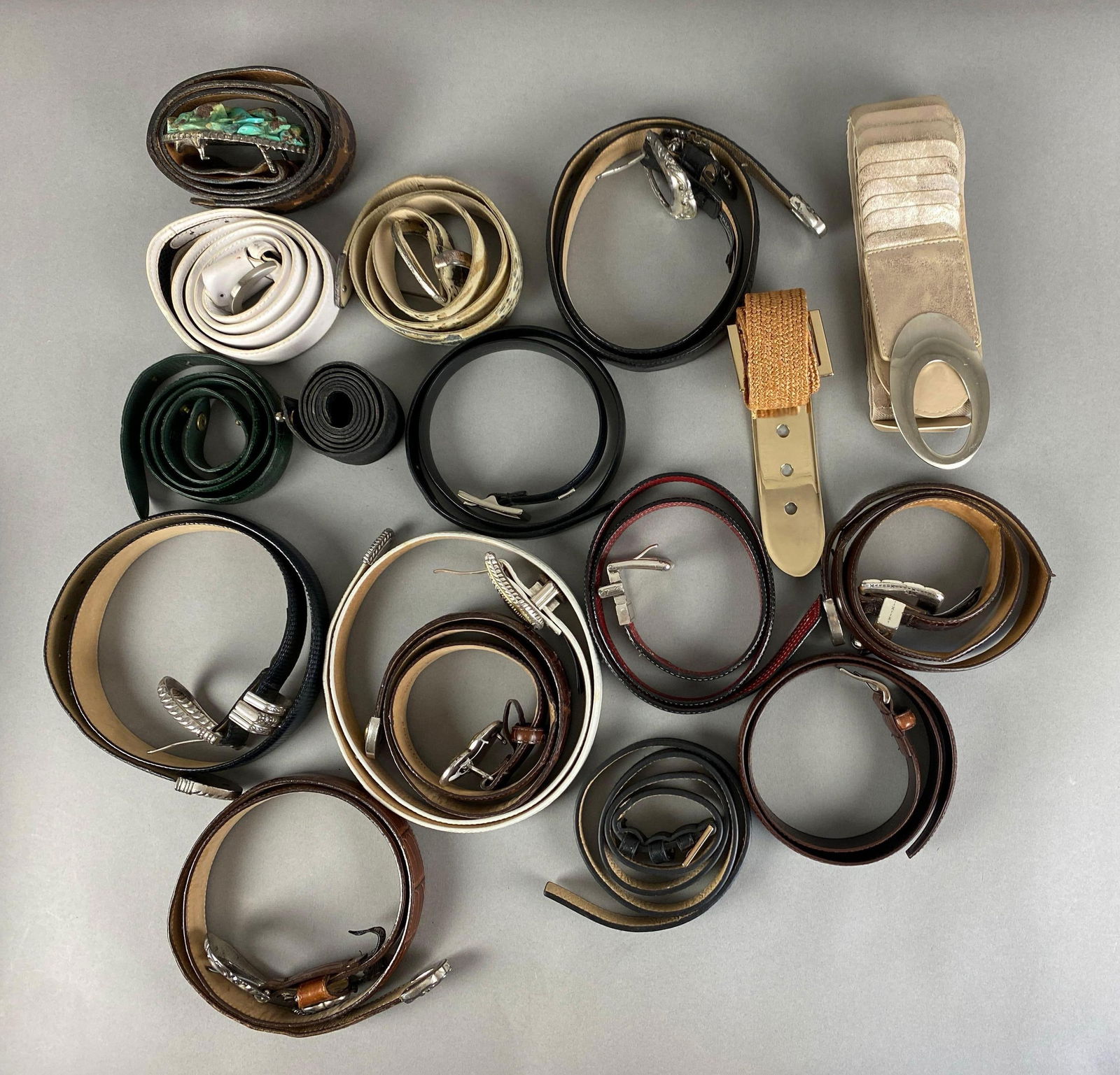 Group of Assorted Belts: includes leather, wove and more, longest measures 40 inches in length