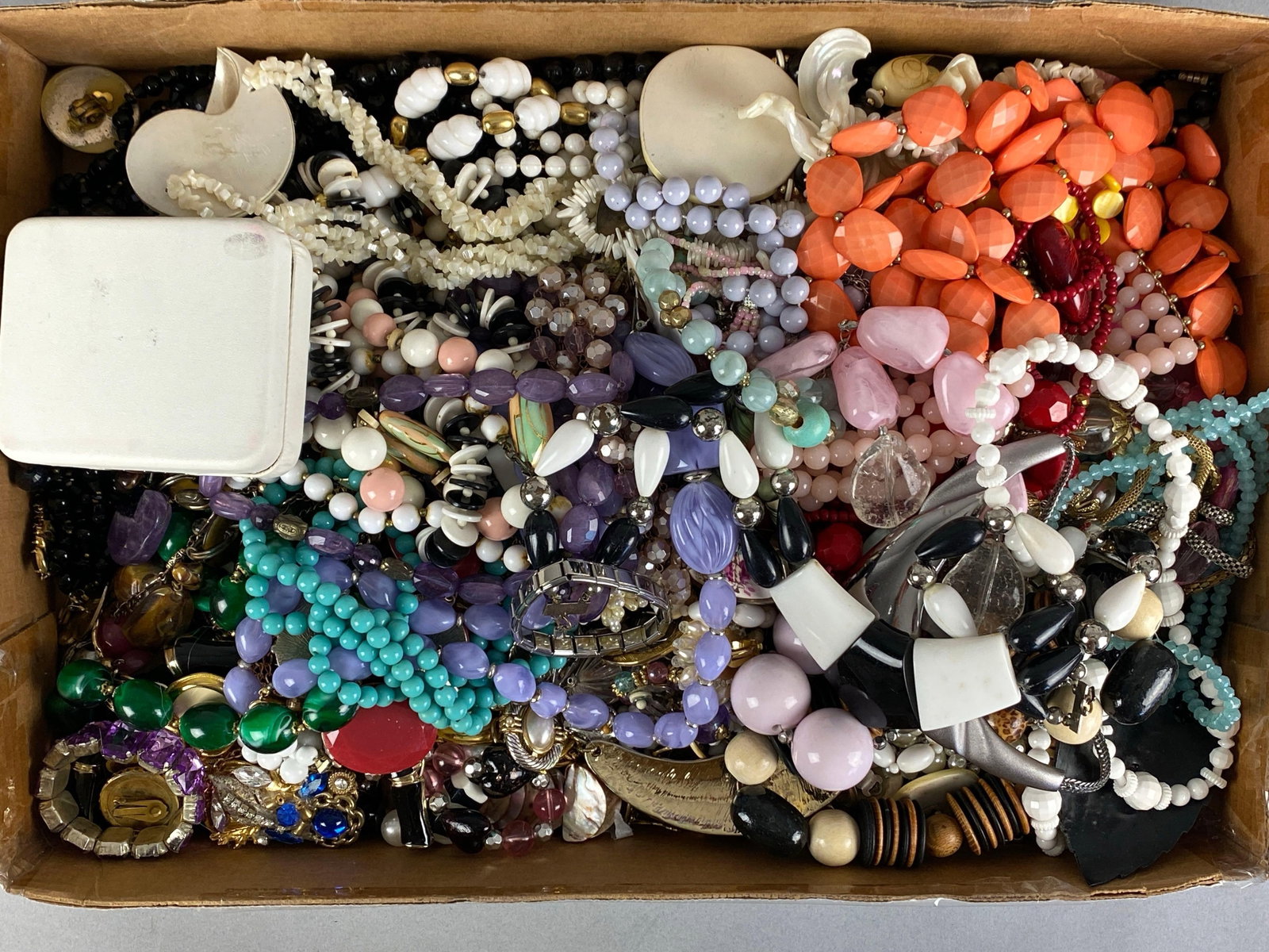 Group of Assorted Costume Jewelry: Includes Necklaces, pins, bracelets and more