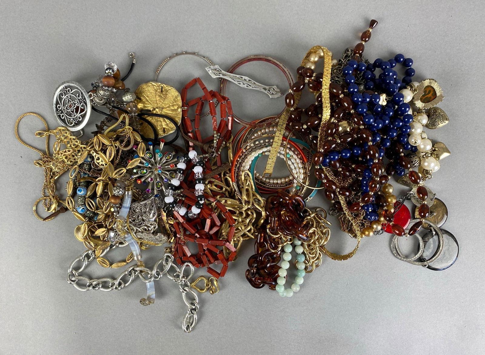 Group of Assorted Costume Jewelry: Includes Chain necklaces, bracelets, faux Pearl and more