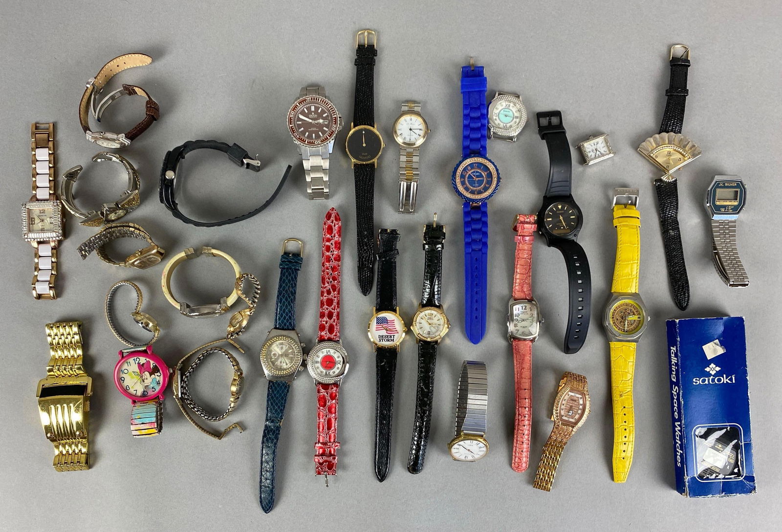 Group of Wristwatches: Includes desert storm, Invicta, Geneva and more, longest measures 9 inches in length