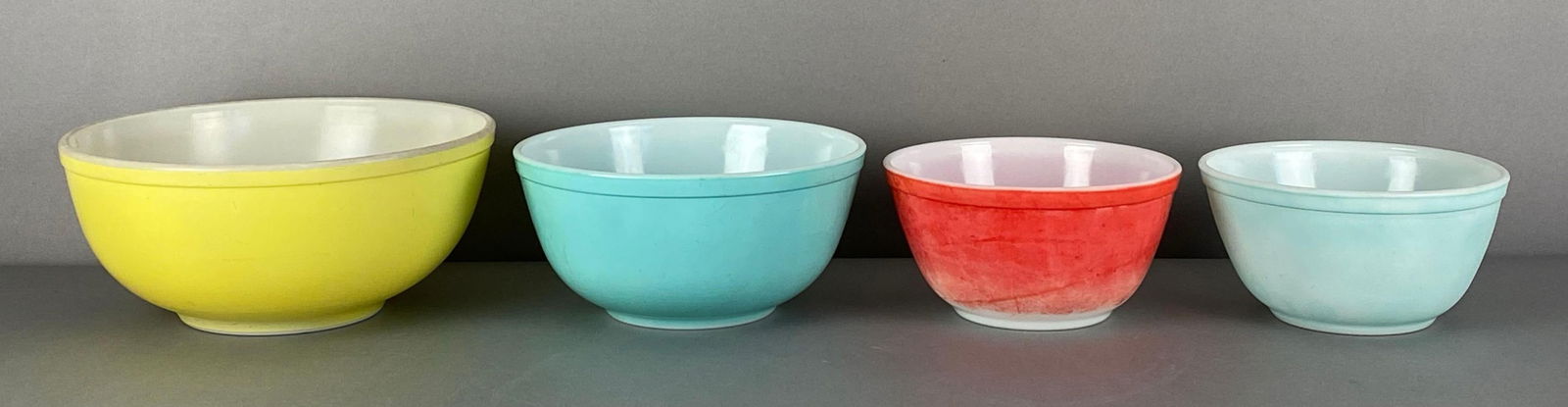 Set of 4 Pyrex Primary Colors Glass Nesting Mixing Bowls: all marked on base, largest measures 10 1/2 x 4 1/2 inches