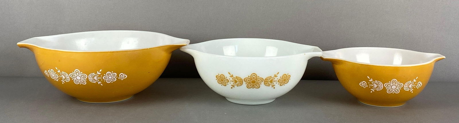 Set of 3 Pyrex Gold Butterfly Cinderella Glass Nesting Mixing Bowls: All marked on base, largest measures 13 x 10 x 4 inches