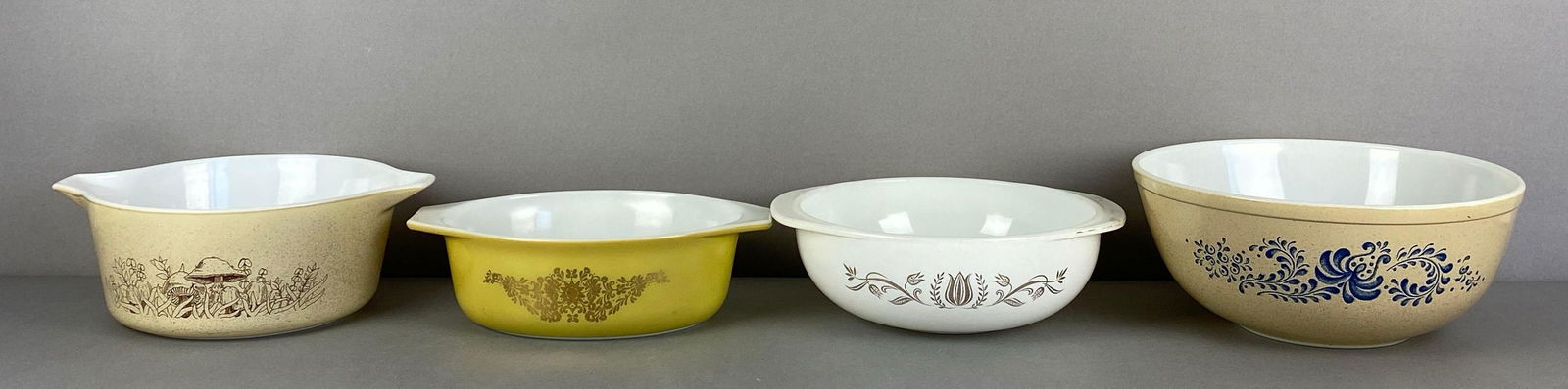 Group of 4 Pyrex Floral Glass Mixing Bowls: largest measures 10 x 4 inches