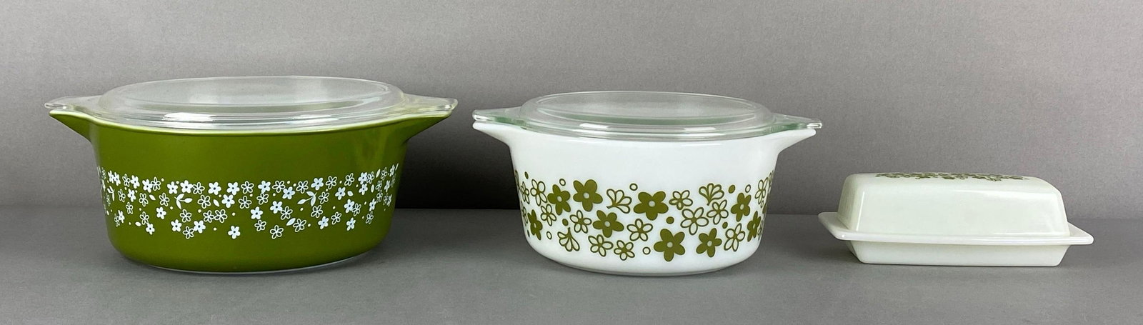 Set of 3 Pyrex Spring Blossum Glass Casseroles and Butter Dish: All marked on base, largest measures 11 x 9 x 4 1/2 inches