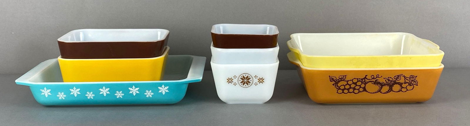 Group of 8 Pyrex Glass Refrigerator: All marked on base, largest measures 11 x 7 x 2 inches