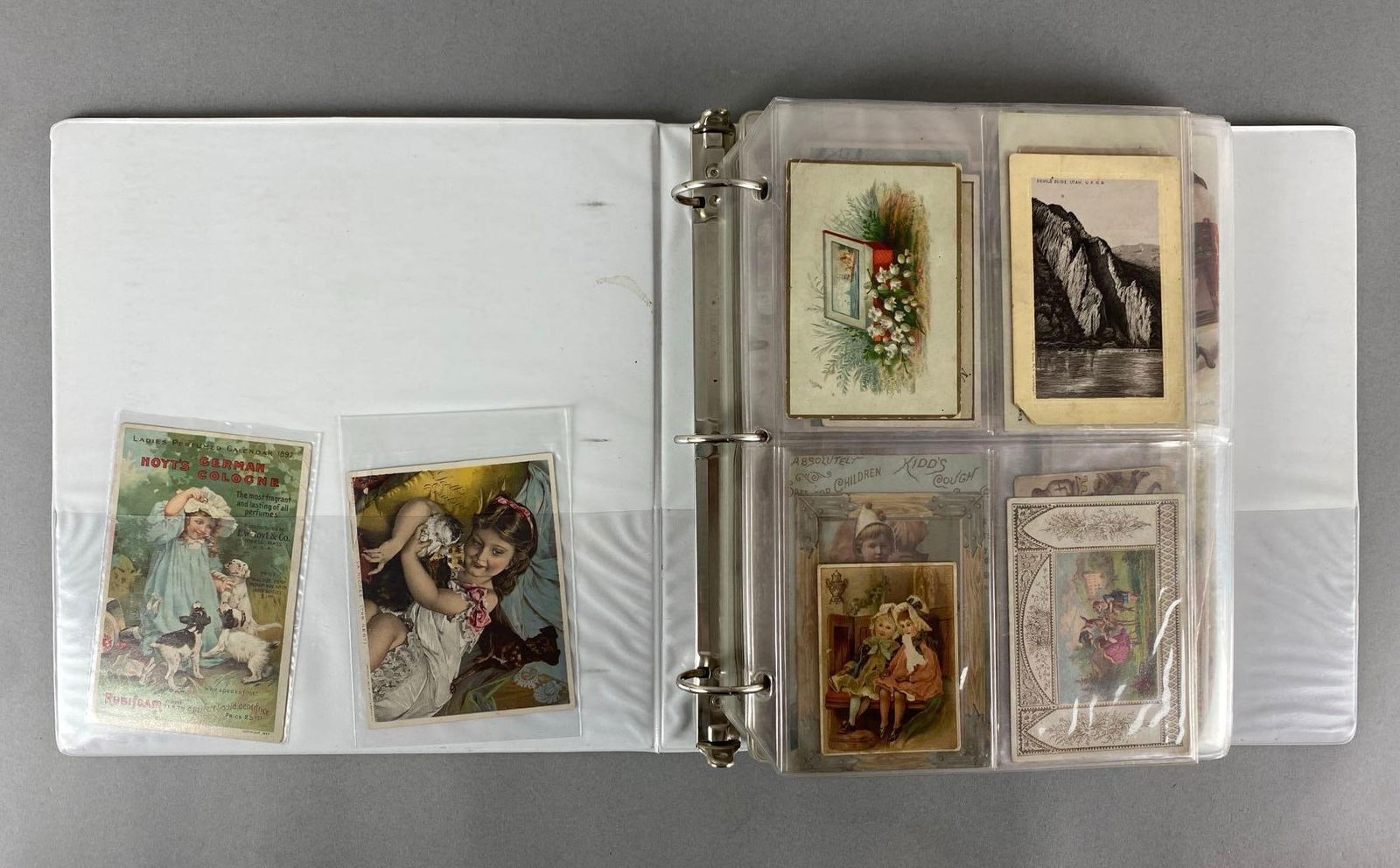Binder Of Antique Adveetising Trade Cards: Includes The Jersey Coffee Co, Dilworts Coffee, J and P coats and more, binder measures 11 x 10 inches