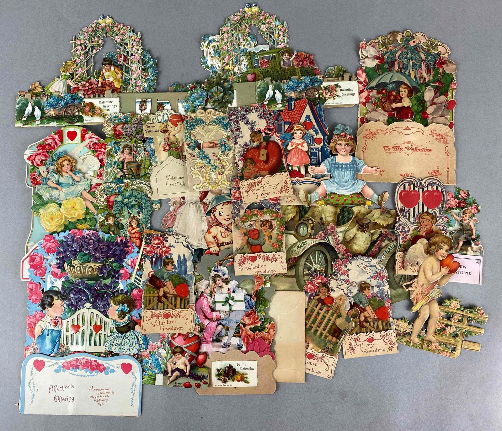 Group of Die-Cut Valentines: Includes mostly fold-out, features cherubs, flowers, fences and more, largest measures 8 x 6 inches