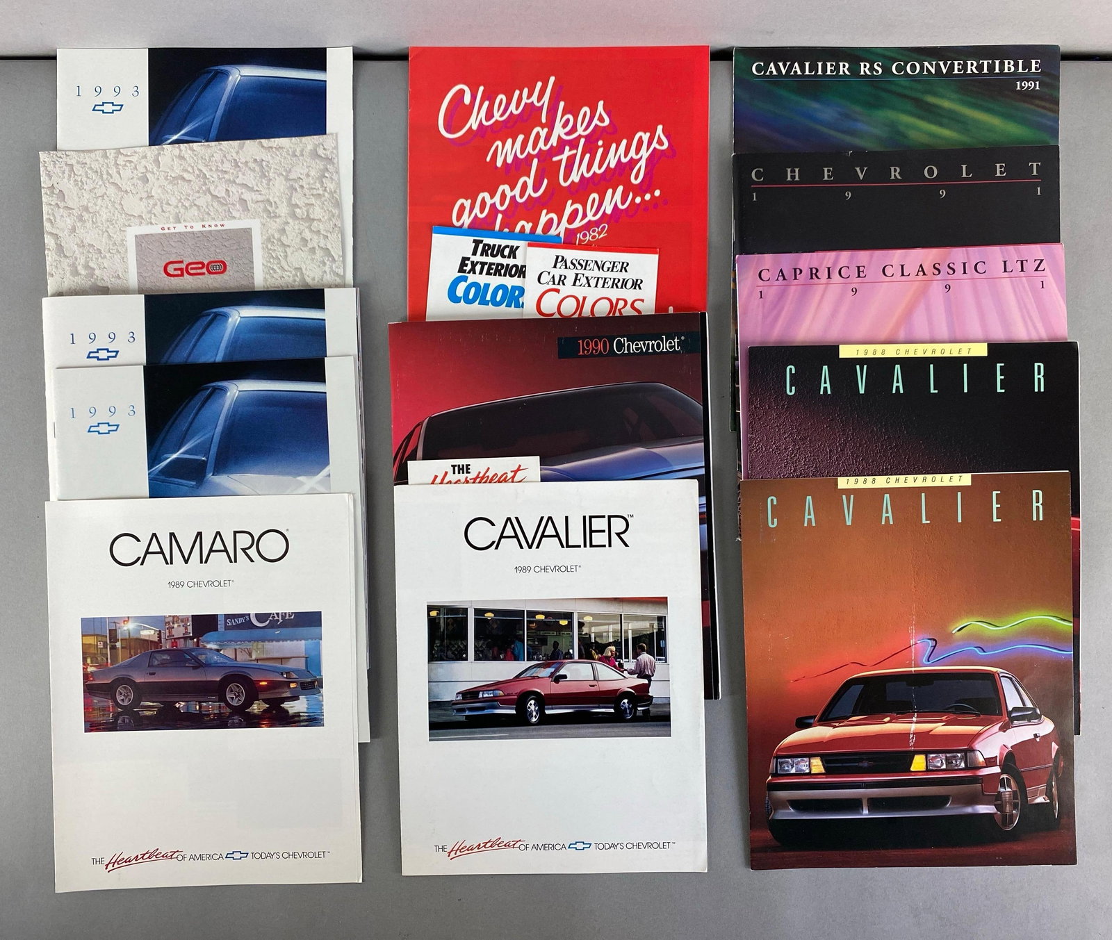 Group of 1980s - 1990s Chevrolet Dealership Advertising Brochures: Includes 1991 cavalier RS Convertible, 1988 Cavalier, 1980 Camaro and more, largest measures 11 x 9 inches