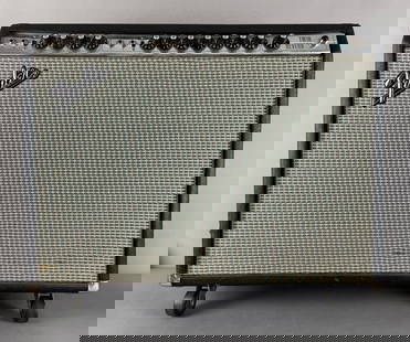 Vintage Fender Twin Reverb Tube Amp: Working condition, small holes on turquoise screen, 2 - 12 inch Utah woofers, includes pedal, tubes, cover. Measures23 x 26 1/2 x 10 1/2 inches