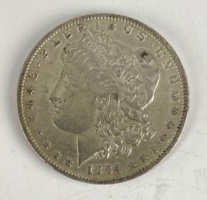 1884 O US $1 Morgan Silver Dollar