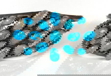 Sterling Silver Native American Turquoise Cuff Bracelet: Measures 5 1/2 inches around interior without gap, Measures 7 inches around interior with gap.