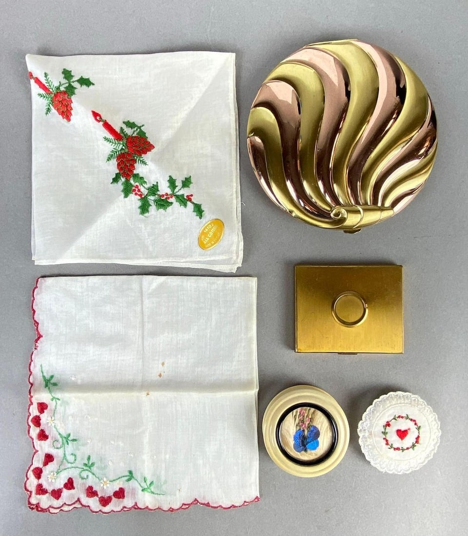 Group of Vintage Beauty Compacts and More: Includes Elgin compacts, Embroidered Cotton handkerchiefs, and more, Some compacts with some original contents, Largest compact measures 5 x 4 3/4 inches.