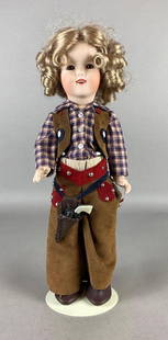 1993 Madonna Shirley Temple Cowgirl Porcelain Doll: No. 679, Doll stand included, Wig not attached, Doll measures 16 inches long.