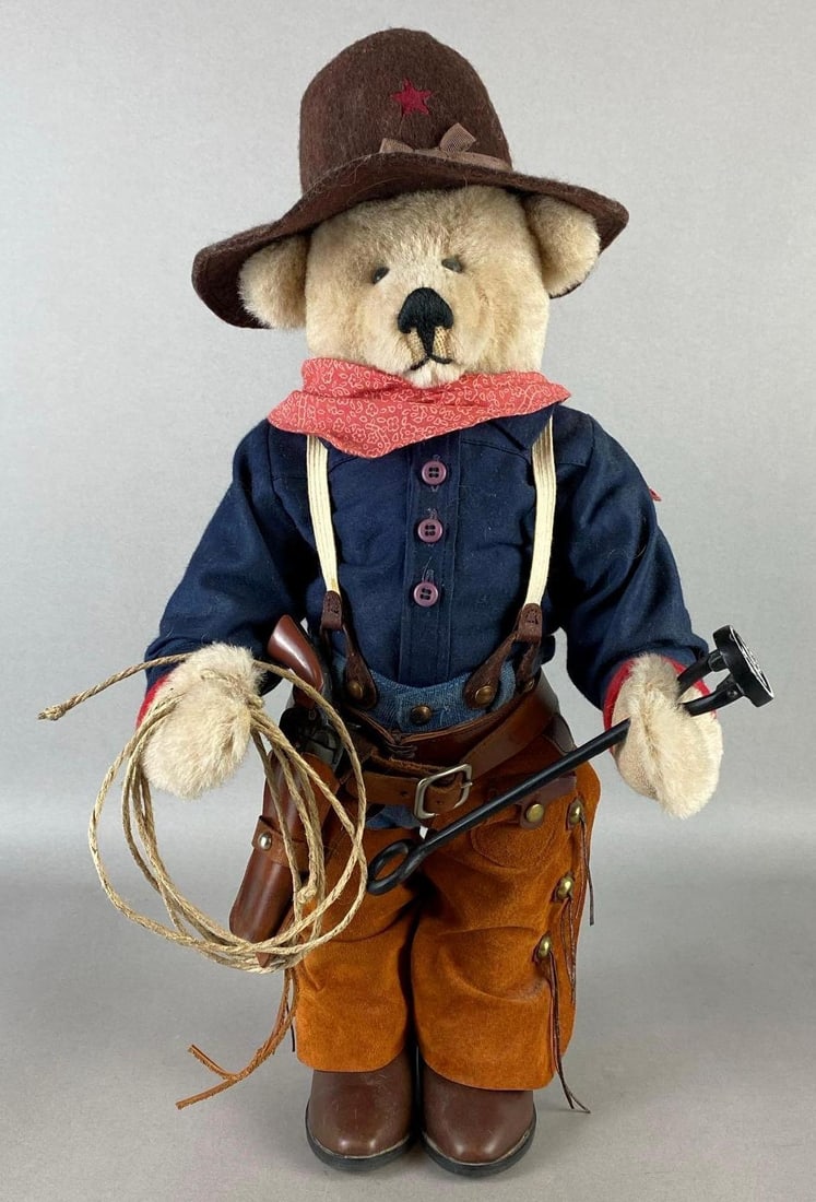 Gary Nett Cowboy Teddy Bear: With letter N branding iron, Marx toy revolver, Measures 20 inches long.