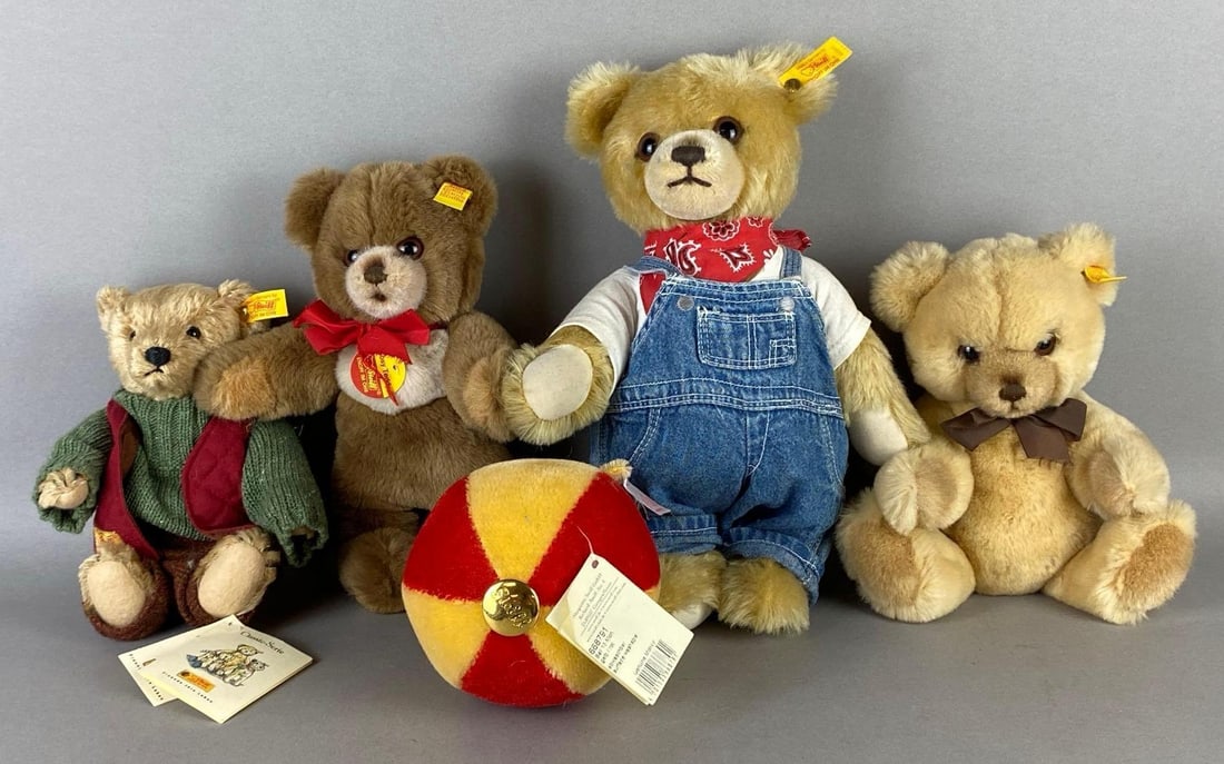 Group of Steiff Teddy Bears and More: Includes 4 Teddy Bears, and 1 ball, All with buttons in ears, Tallest measures 13 inches tall.