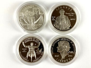 Group of 4 Commemorative Silver Dollars