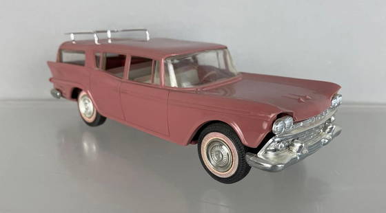 Johan 1959 AMC Rambler Station Wagon Friction Dealership Promo Car: Hibiscus rose, warp above headlights, tinted pink side walls, replaced roof rack, good finish