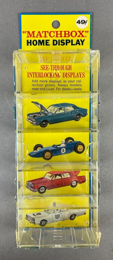1969 Matchbox Home Display: A Lesney Product, Fred Bronner Corporation, Measures 10 1/4 x 3 1/2 x 1 1/2 inches.