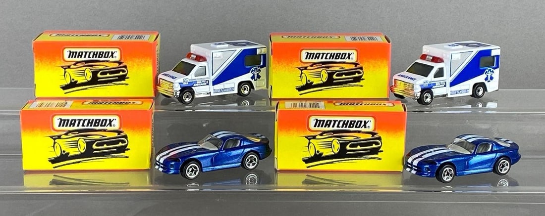 Group of 4 Matchbox Die-Cast Vehicles: With original boxes, Includes No. 1 Dodge Viper GTS Coupe, and No. 51 Ambulance.