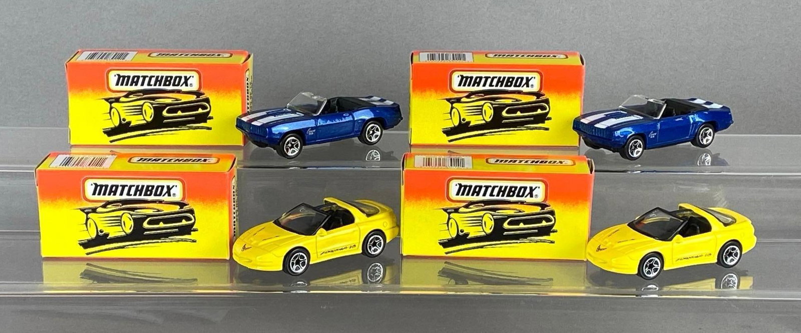Group of 4 Matchbox Die-Cast Vehicles: With original boxes, Includes No. 20 97 Firebird Formula, and No. 40 69 Camaro SS 396.