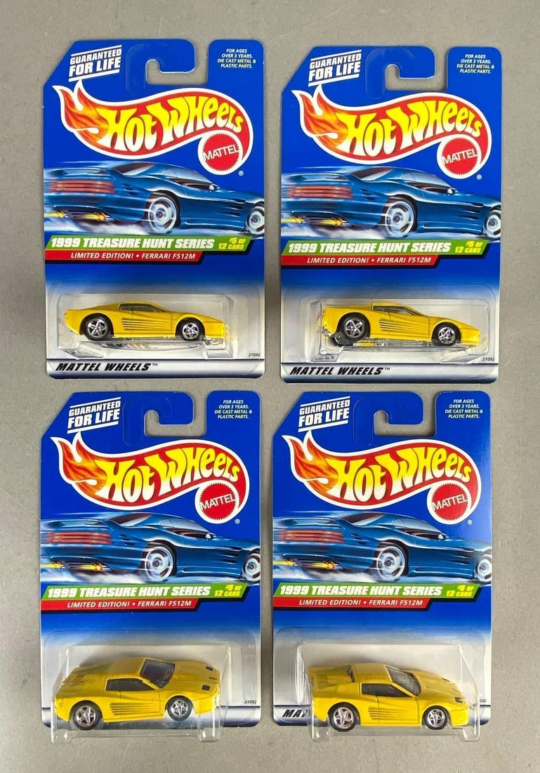 Group of 4 Mattel Hot Wheels Treasure Hunt No. 5 Ferrari F512M: Die-Cast, Limited Edition, In original packaging, Packaging measures 6 1/2 x 4 1/4 x 1 1/2 inches.
