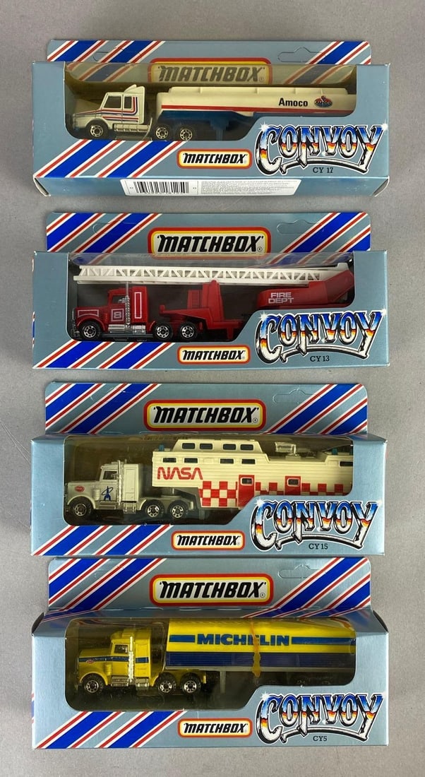 Group of 4 Matchbox Convoy Die-Cast Vehicles: Includes No. CY17 Scania Petrol Tanker, No. CY15 Peterbilt NASA Tracking Vehicle, No. CY13 Fire Engine, and No. CY5 Peterbilt Covered Truck, Packaging measures 3 3/4 x 8 x 1 3/4 inches.