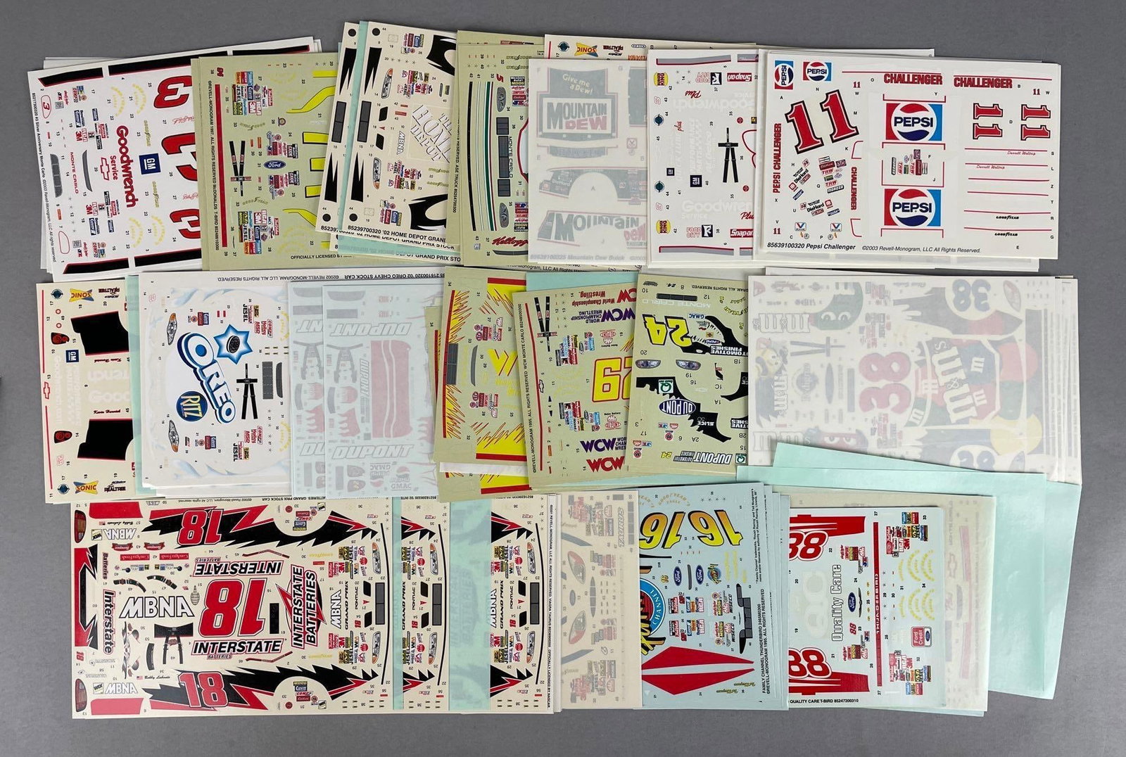 Group of 100 Revell Monogram NASCAR Model Decal Sheets: 20 sets of 5