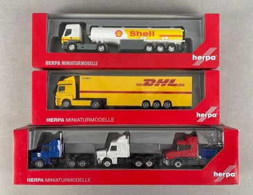 Group of Herpa Plastic Tractor Trailers