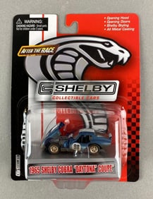 Carroll Shelby 1965 Shelby Cobra Daytona Coupe Die-Cast Car