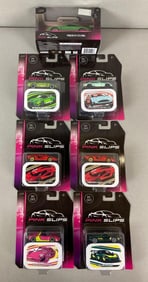 Group of 7 Jada Pink Slip Die-Cast Cars