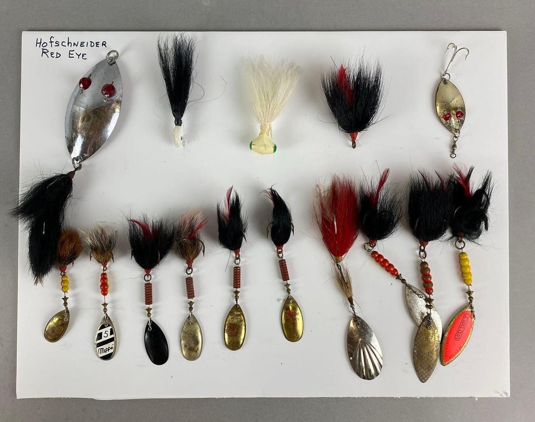 Group of 15 Vintage Spoon Fishing Lures: Includes Hofschneider Red Eye, Mepps Giant Killer, Mepps 5 and more. Largest measures 10 inches in length.