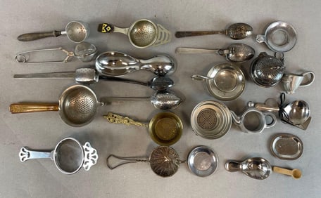 Group of Tea Strainers Spoons and More