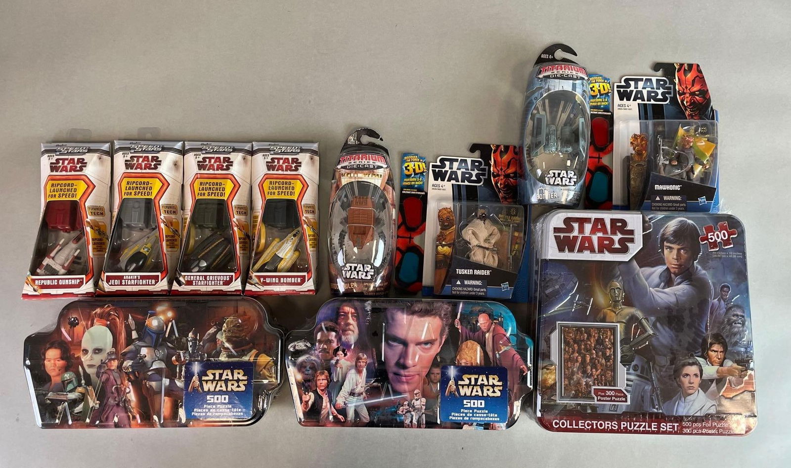 Group of Star Wars Speed Stars and More: Includes puzzles, action figures, die-cast tie bomber