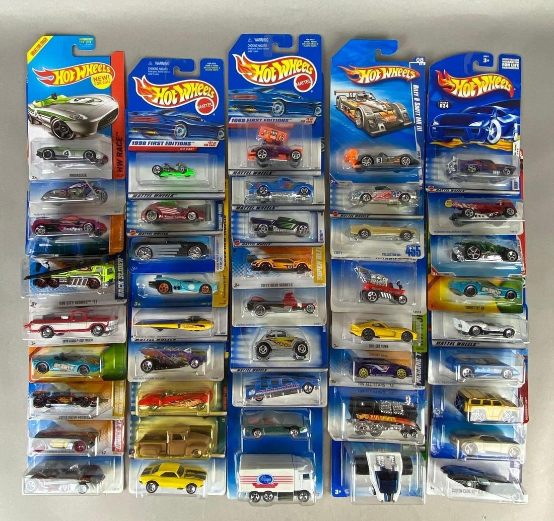 Group of 40+ Hot Wheels Die-Cast Vehicles: Includes Dodge XO-07, Custom Cadillac Fleetwood, Hummer H3, and more.