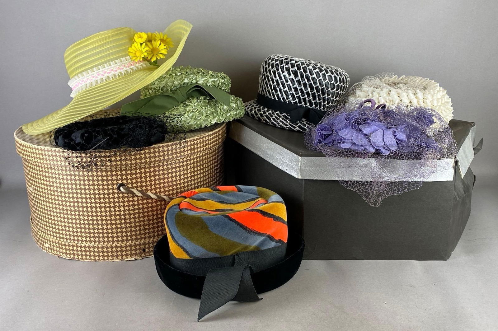 Group of 7 Vintage Womens Hats: Includes 3 hatboxes, Includes La Verle, and unmarked, Largest hatbox measures 7 1/2 x 19 x 19 inches.