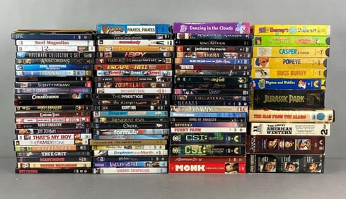 Large Group of DVDs and VHS Tapes
