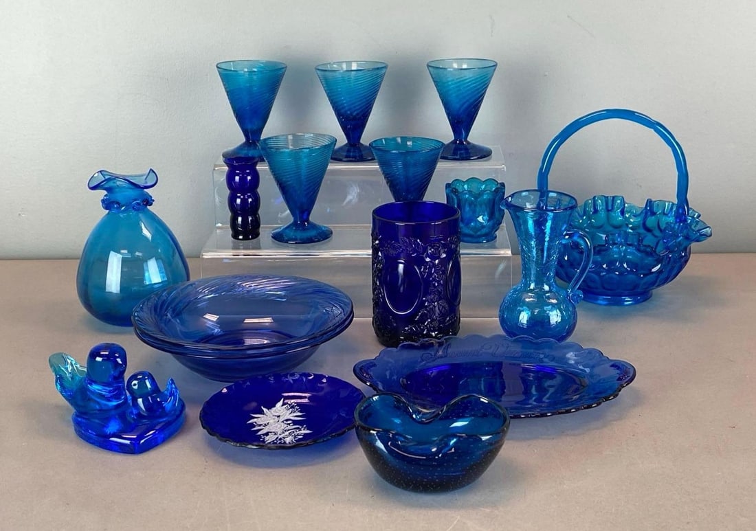 Group of Cobalt Glass Items: Includes coindot basket, glasses, pitcher and more, largest measures 8 x 7 x 7 inches