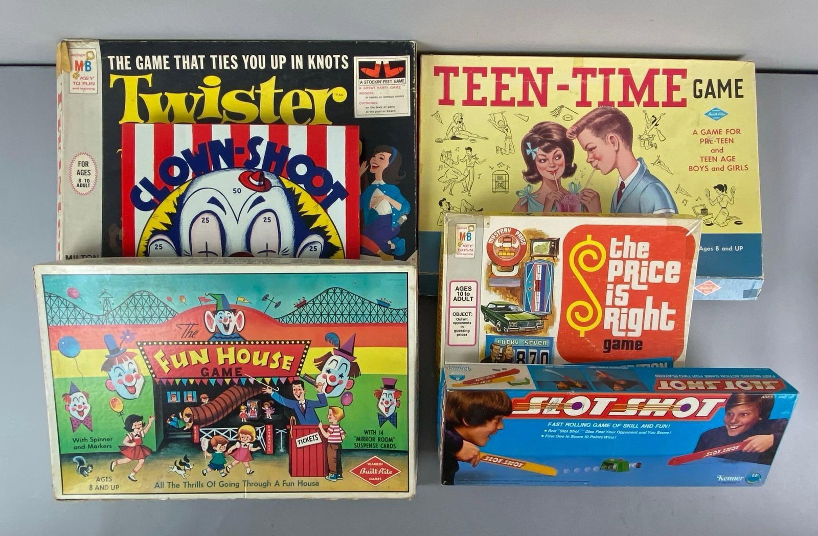 Group of 6 Board Games: Sets seem complete, includes The price is right, slot shot, Twister and more, largest measures 18 x 13 1/2 inches