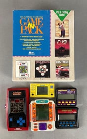 Group of Handheld Video Games and More