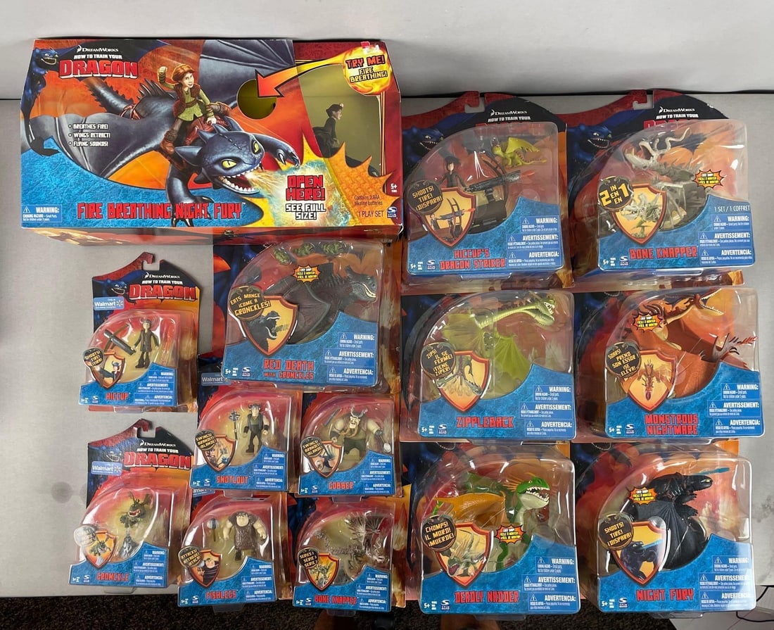 Group of Spin Master How to Train Your Dragon Action Figures: Red death blister separated from cardboard, largest box measures 9 x 18 1/2 x 7 inches