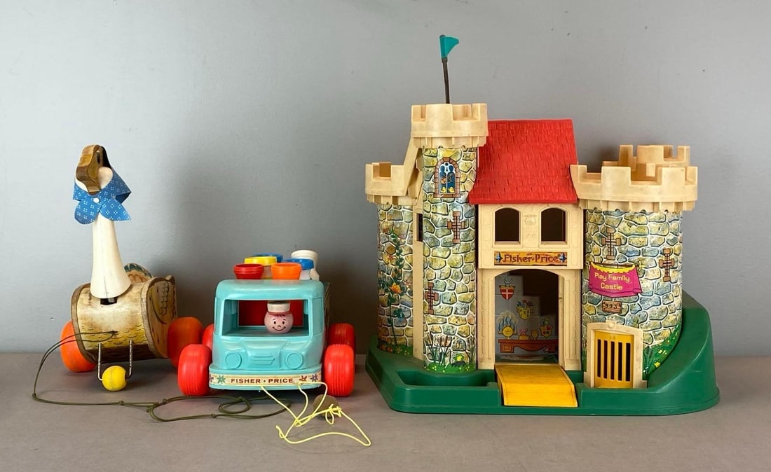 Group of Fisher Price Toys and Playset: Includes mother goose pull toy, milk wagon pull toy and play family castle playset, largest measures